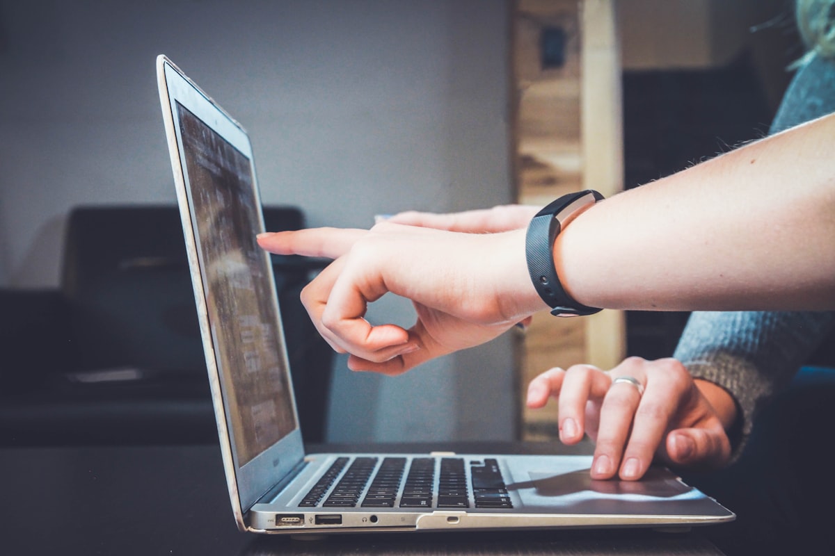 Person learning at a laptop — staying with the work